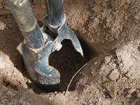 Post hole prepared for basketball goal installation